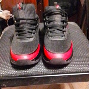 Red and black Fila sneakers